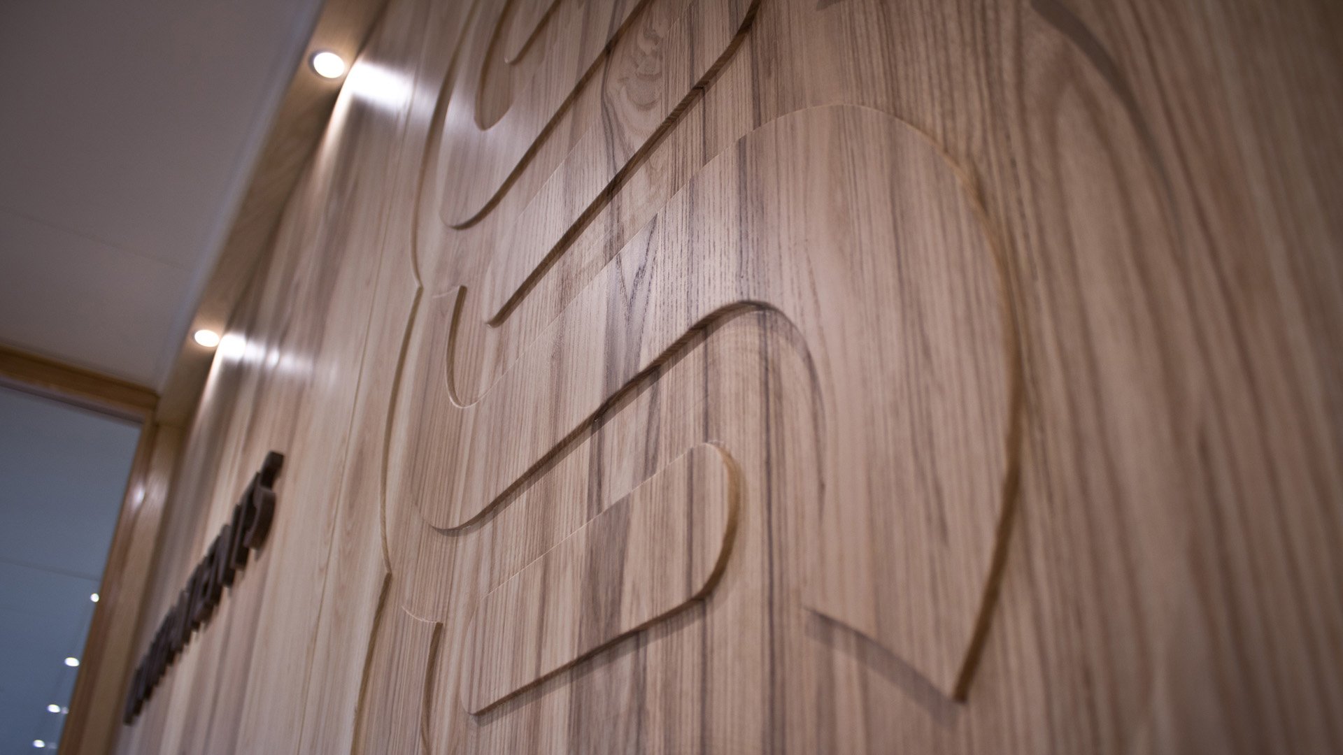 Wood engraved logo at Ulster Clinic Belfast