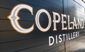 Copeland Distillery's branded, sliding exterior door